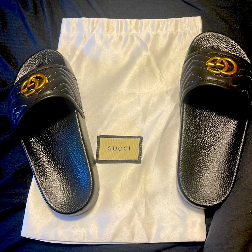 Never used  black and gold GG Mormont Gucci slides